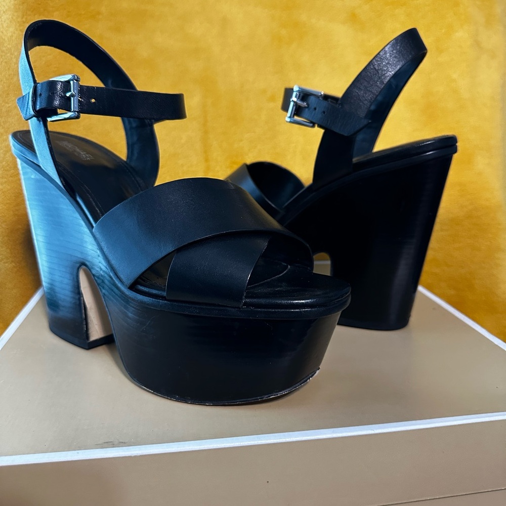 Michael Kors Black Divia Wedge Leather shoe, in a size 8.5.